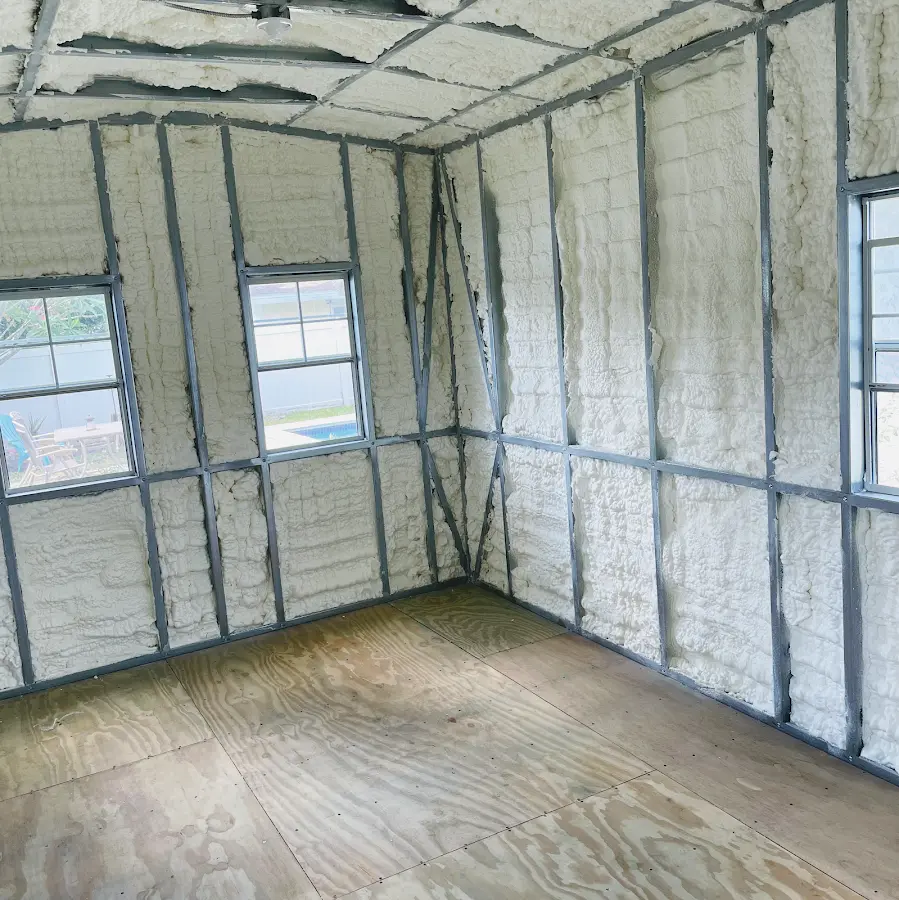 Closed-cell spray foam insulation applied to wall cavities in a residential project in Fredonia